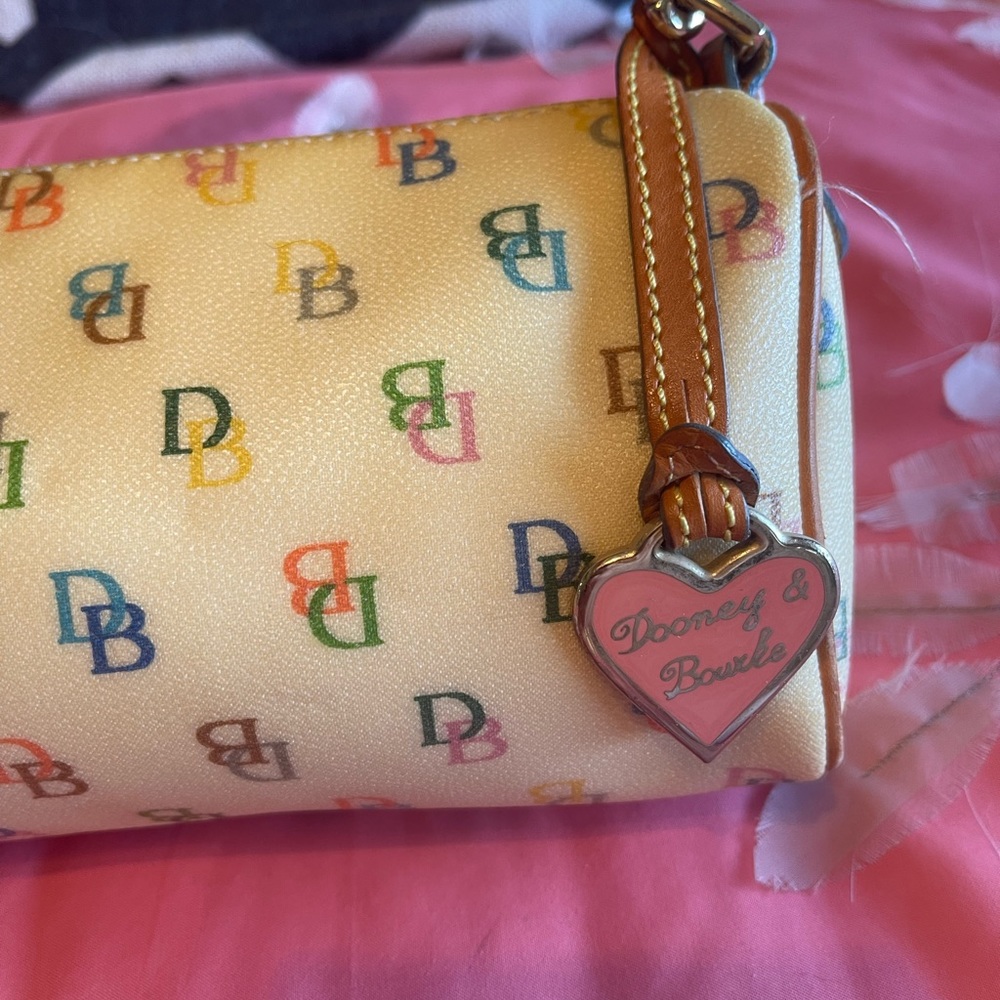 Precious little Dooney and Burke bag !